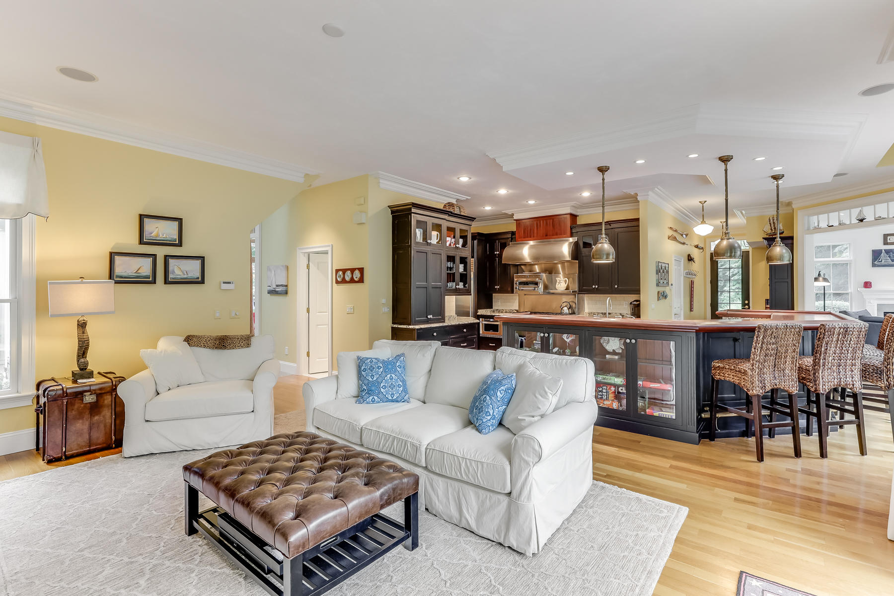 51 Meadow Farm Road Centerville, MA 02632 - Photo 5 of 45 a living room with furniture kitchen view and a table