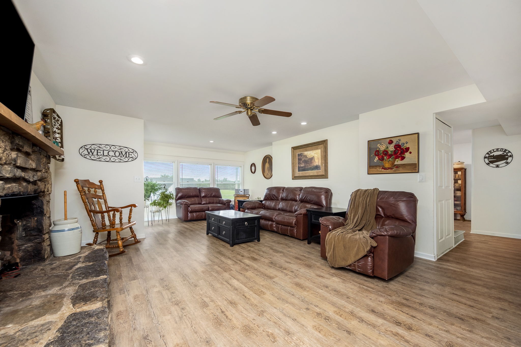 540 Powell Hollow Road Tullahoma, TN 37388 - Photo 17 of 83 a living room with fireplace furniture and a flat screen tv