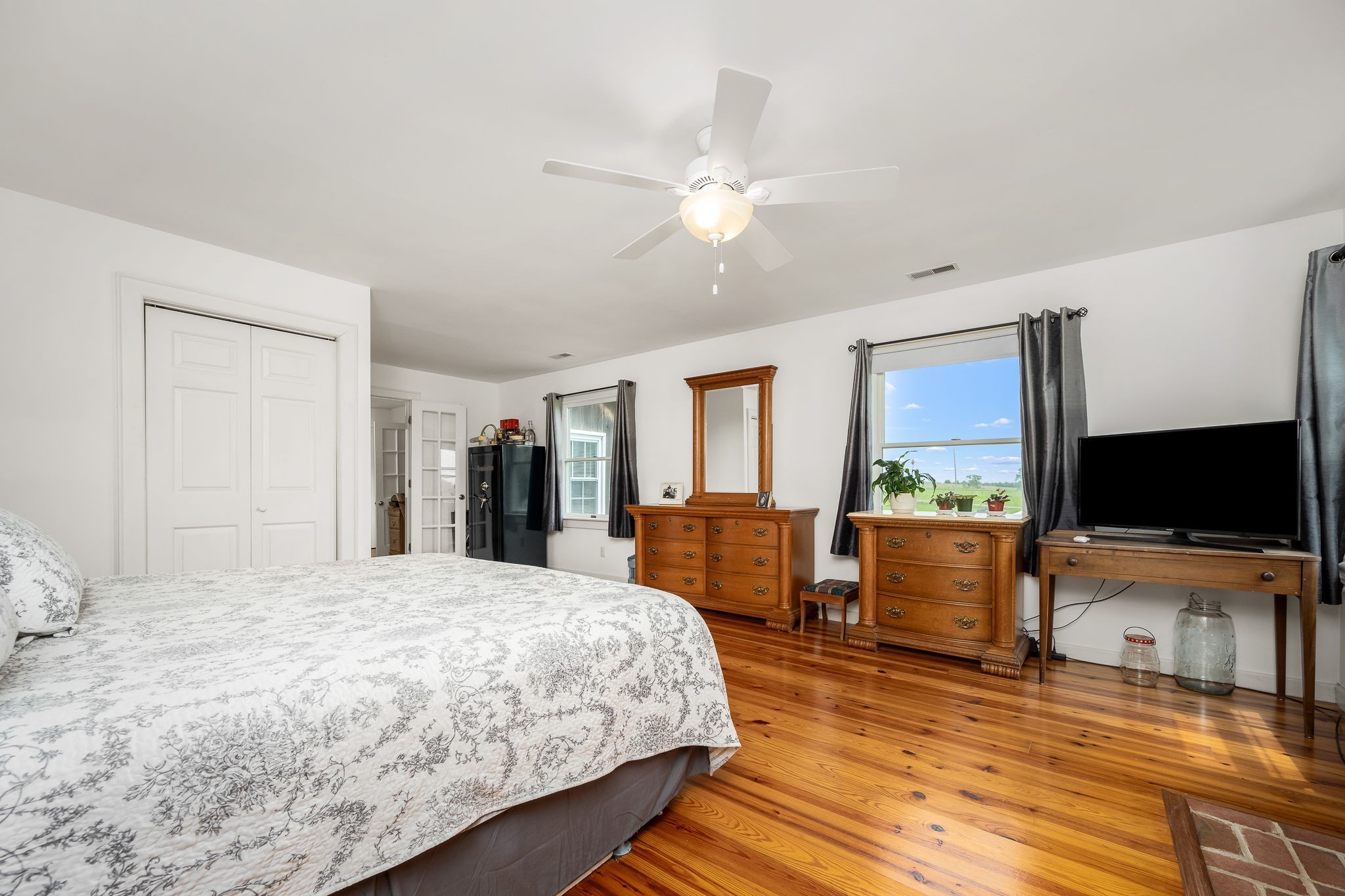 540 Powell Hollow Road Tullahoma, TN 37388 - Photo 30 of 83 a bedroom with a bed and a flat screen tv