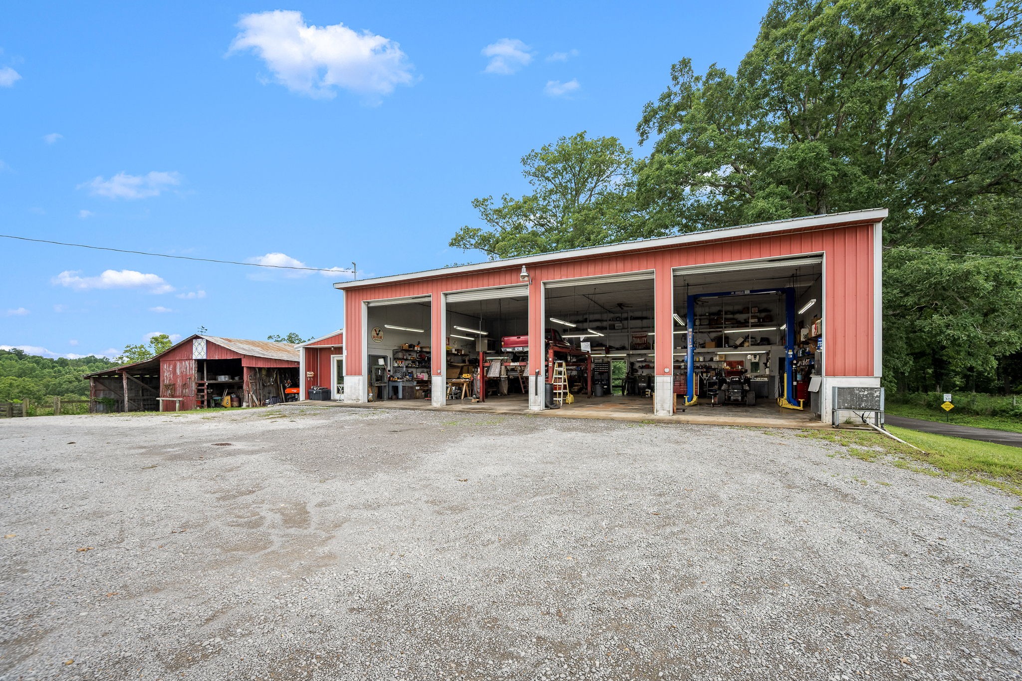 540 Powell Hollow Road Tullahoma, TN 37388 - Photo 3 of 83 a view of a house with a porch and a large tree