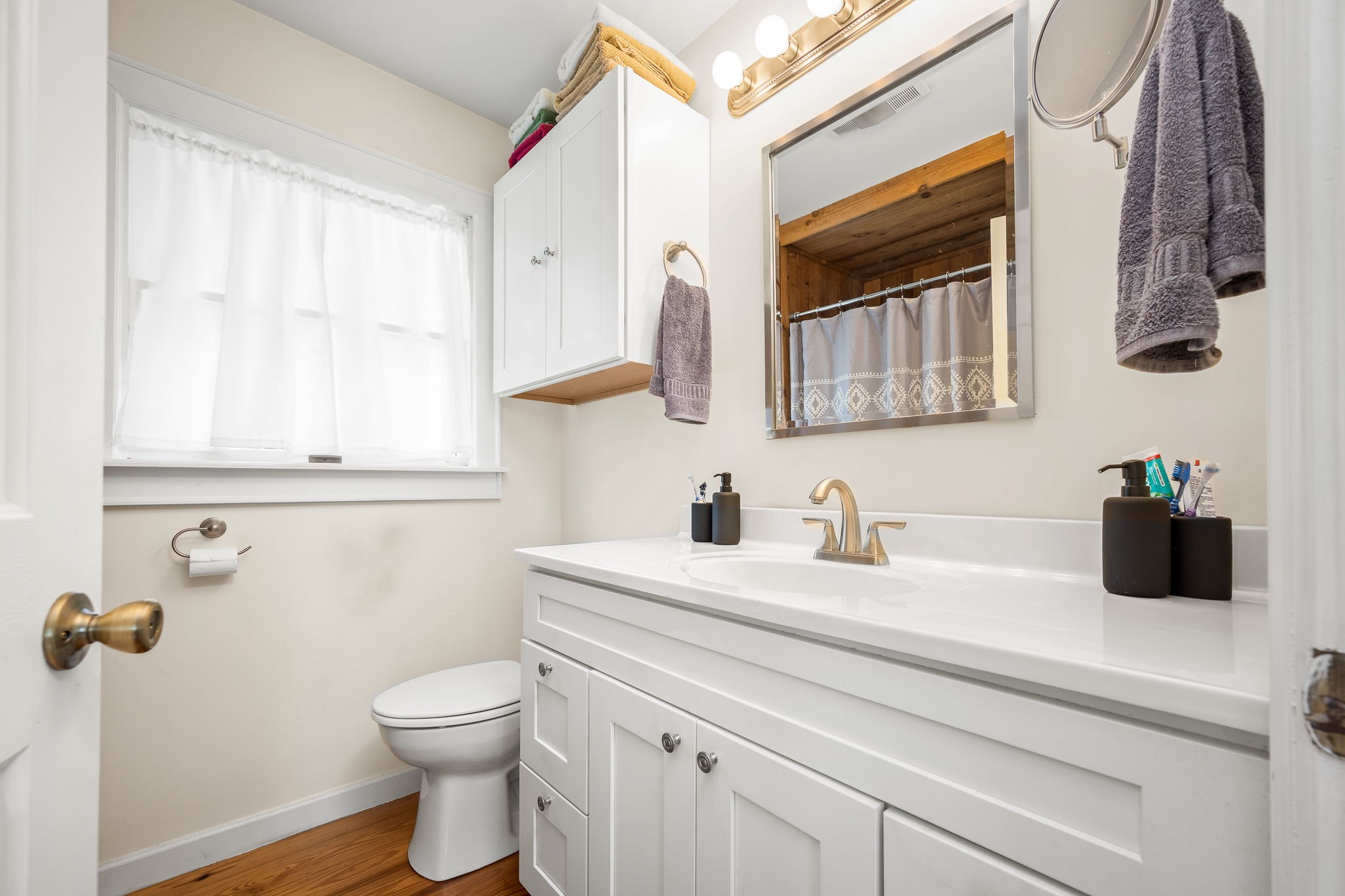 540 Powell Hollow Road Tullahoma, TN 37388 - Photo 31 of 83 a bathroom with a granite countertop sink toilet and mirror