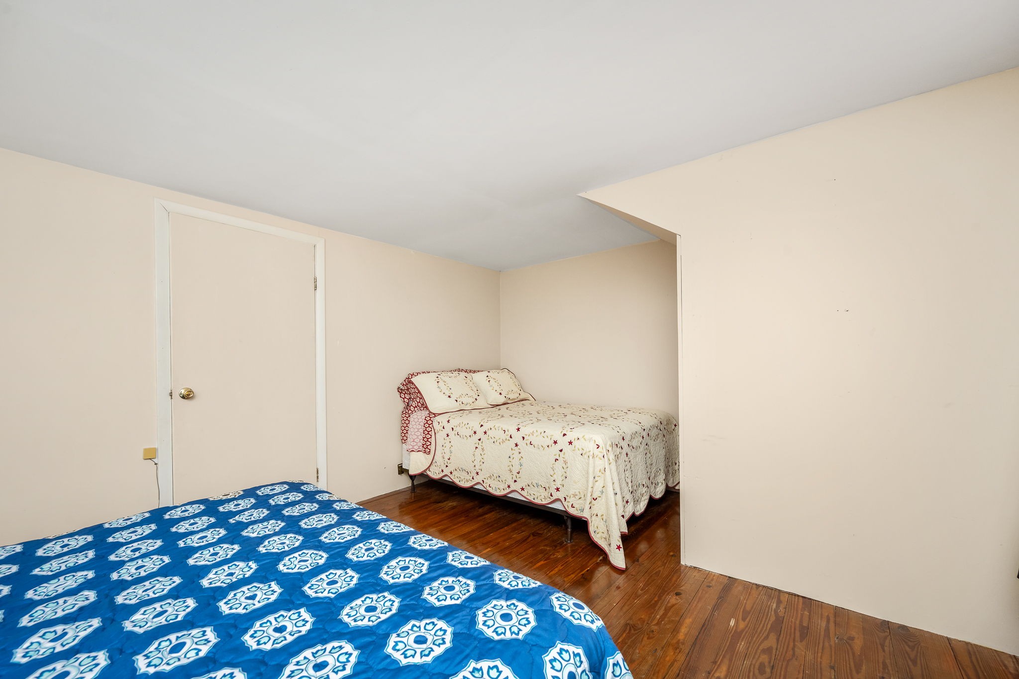 540 Powell Hollow Road Tullahoma, TN 37388 - Photo 44 of 83 a bedroom with a bed and wooden floor