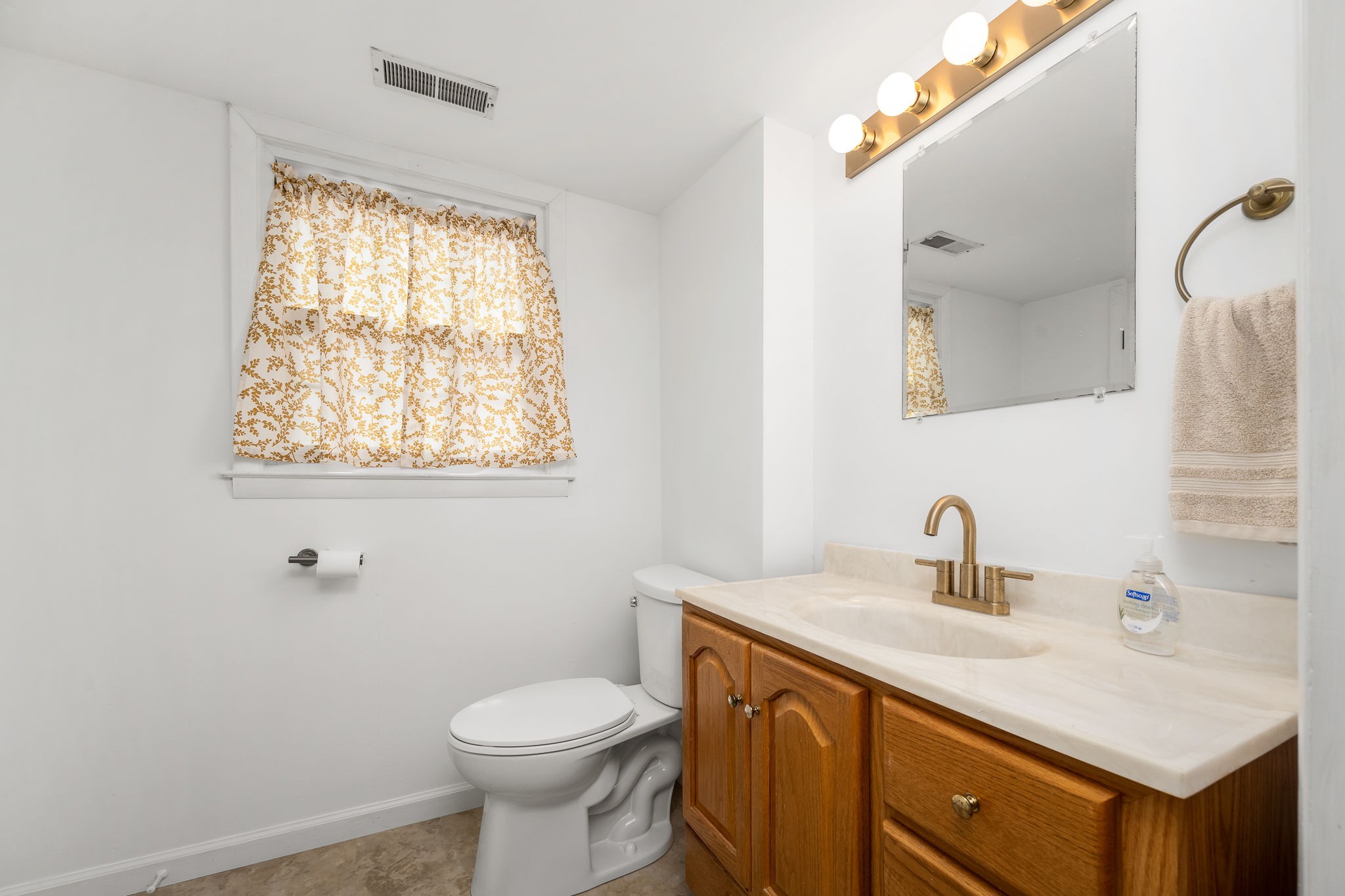 540 Powell Hollow Road Tullahoma, TN 37388 - Photo 46 of 83 a bathroom with a sink vanity mirror and toilet