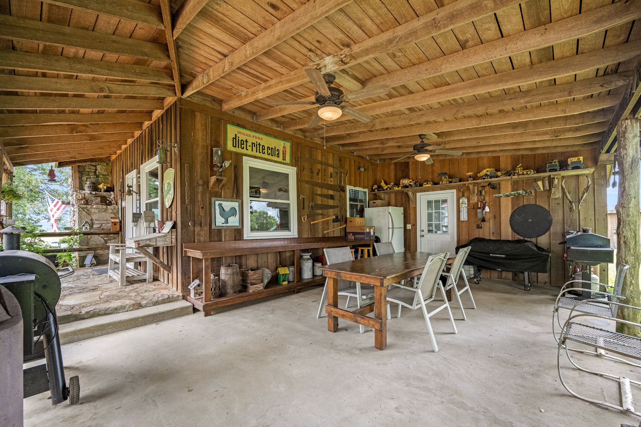 540 Powell Hollow Road Tullahoma, TN 37388 - Photo 55 of 83 a view of a chairs and tables in a patio