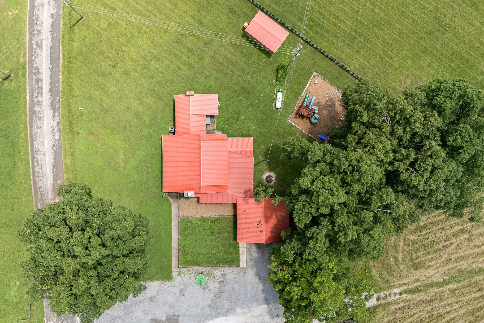 540 Powell Hollow Road Tullahoma, TN 37388 - Photo 63 of 83 an aerial view of a house with a yard and a fountain