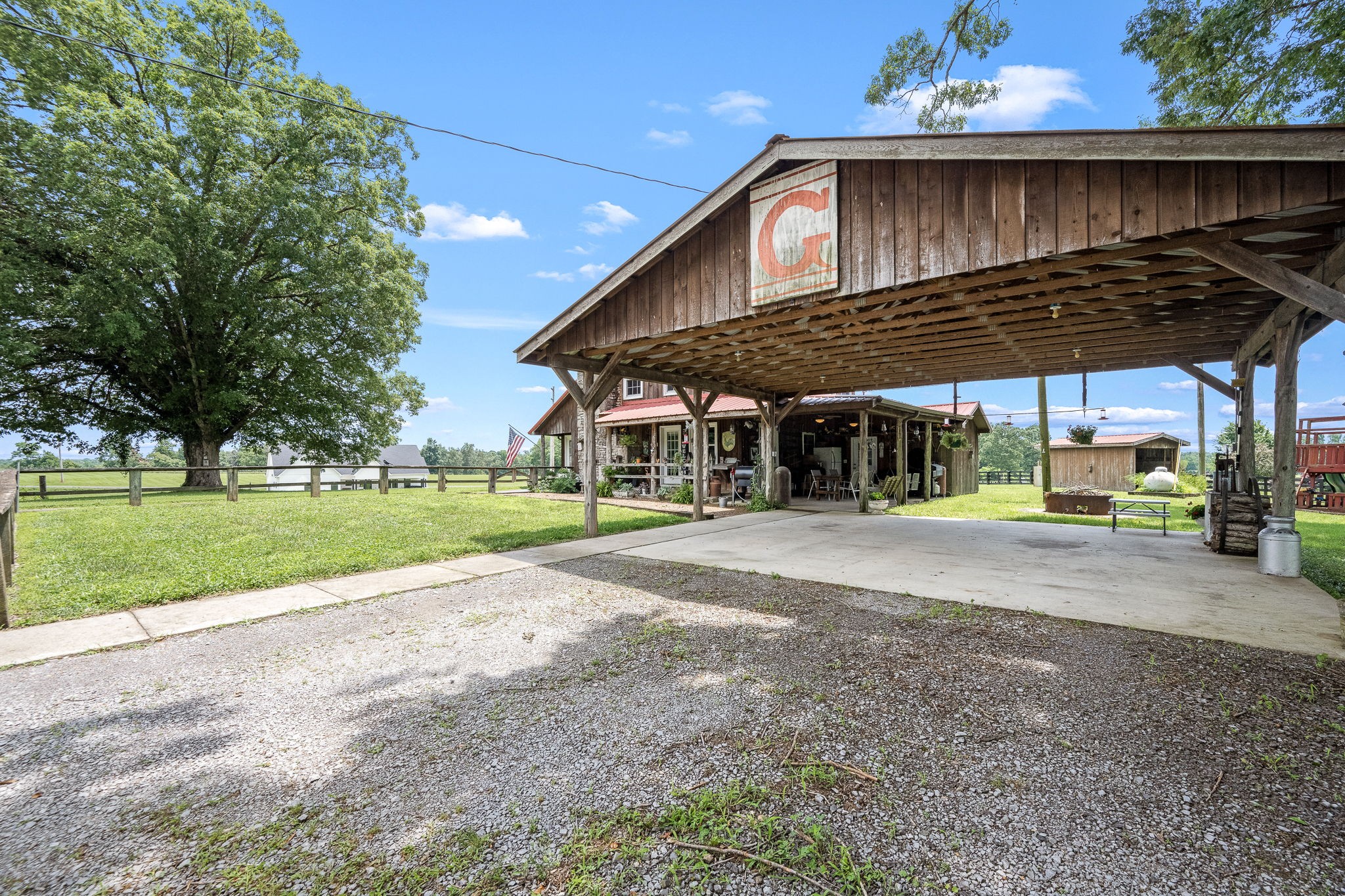 540 Powell Hollow Road Tullahoma, TN 37388 - Photo 7 of 83 a view of a house with backyard and sitting area