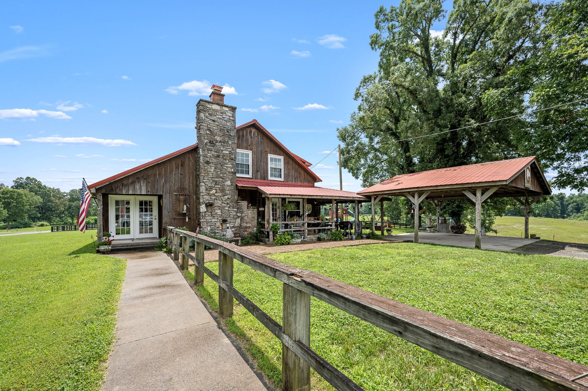 540 Powell Hollow Road Tullahoma, TN 37388 - Photo 10 of 83 a front view of a house with yard porch and furniture