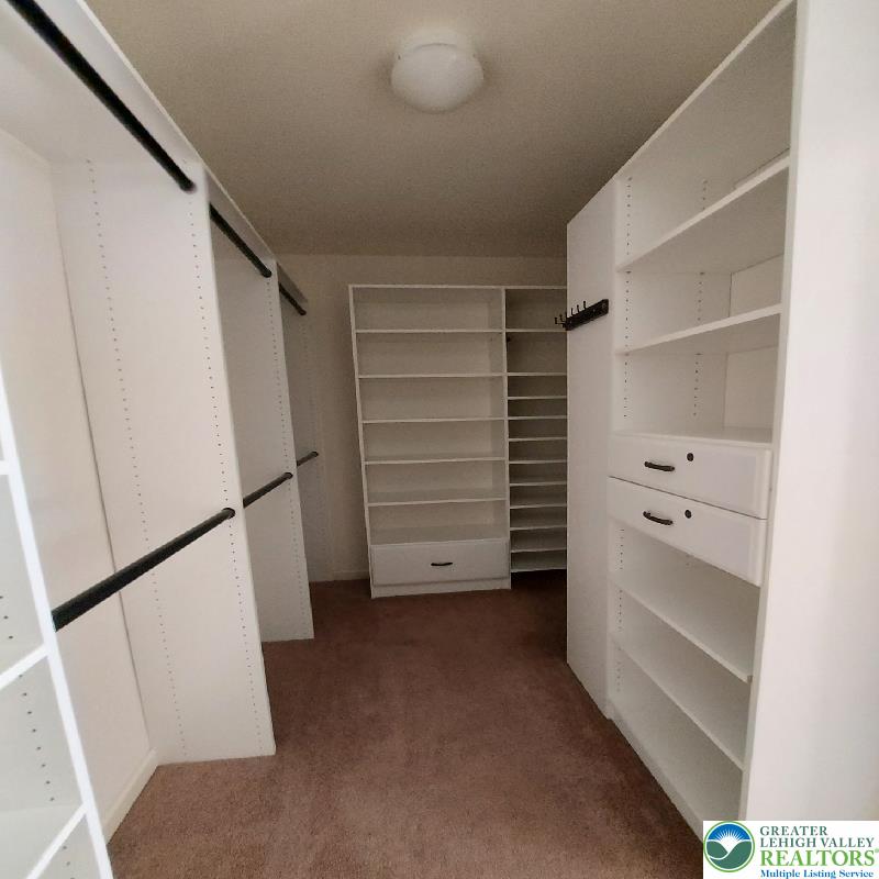 4704 Reston Drive Easton, PA 18040 - Photo 16 of 32 a view of walk in closet with empty racks