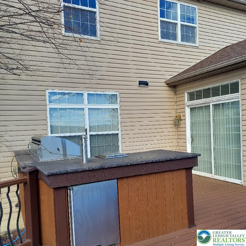 4704 Reston Drive Easton, PA 18040 - Photo 25 of 32 a backyard of a house with large window