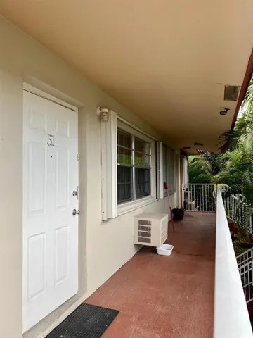 a view of livingroom with furniture and porch