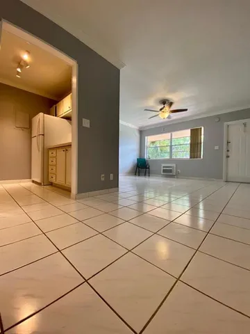 a view of a livingroom with wooden floor