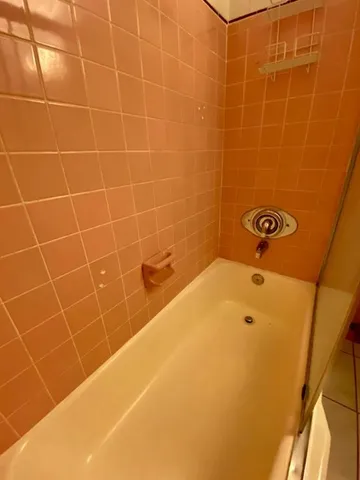 a bathroom with a bathtub