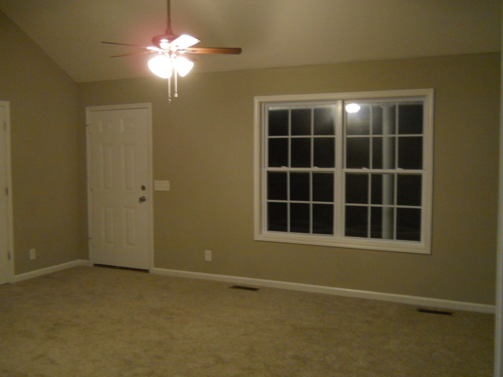 9995 Chestnut Ridge Road Lynchburg, TN 37352 - Photo 3 of 14 a view of an empty room with a window