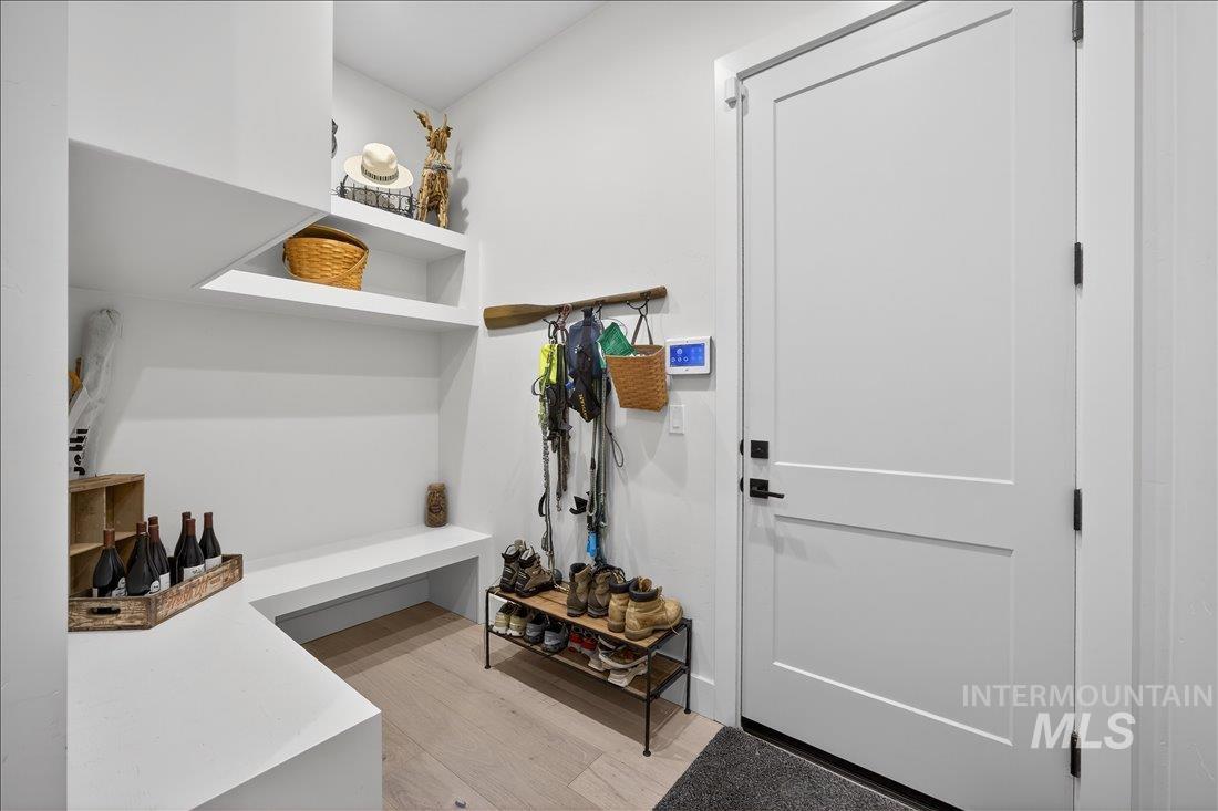 4718 East Goldstone Drive Meridian, ID 83642 - Photo 34 of 50 Mudroom featuring light wood-style floors