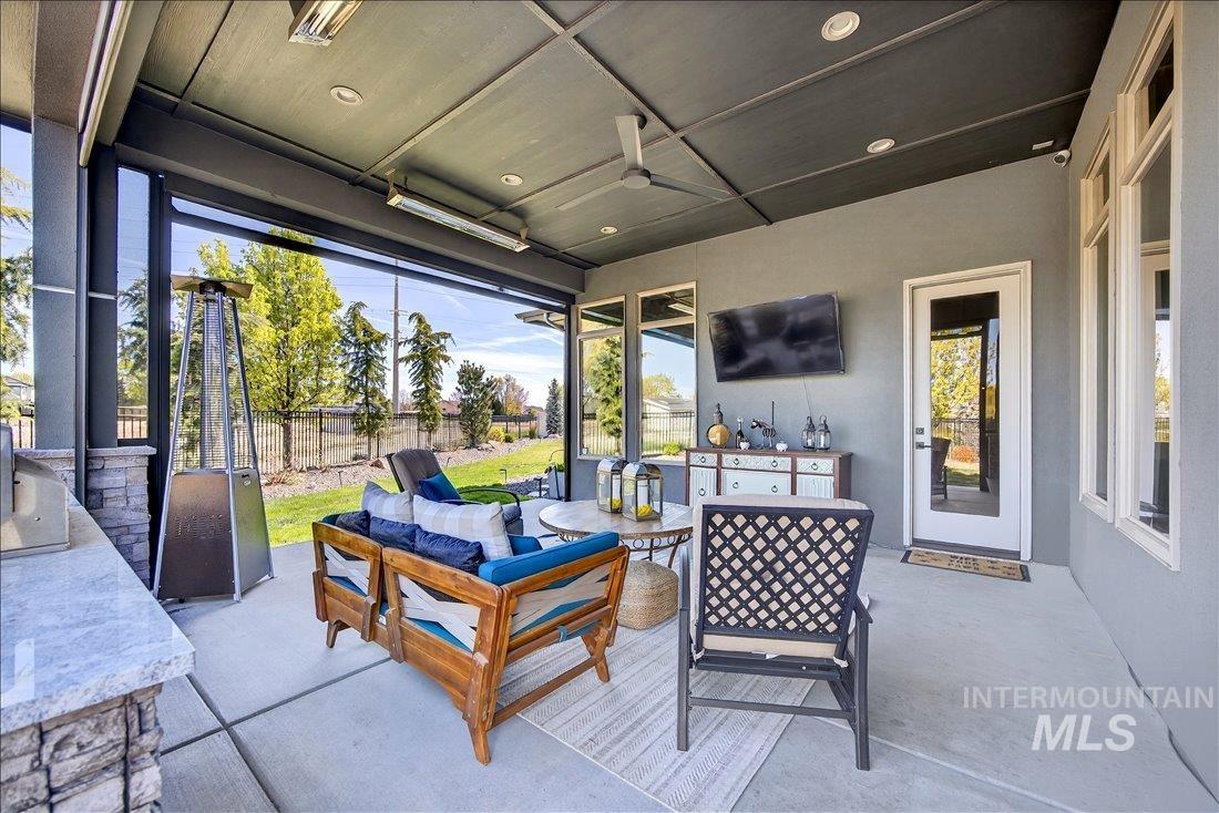 4718 East Goldstone Drive Meridian, ID 83642 - Photo 36 of 50 View of patio / terrace featuring an outdoor kitchen and area to lounge and ceiling fan
