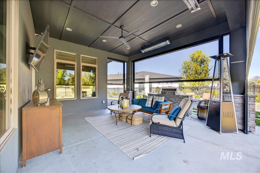 4718 East Goldstone Drive Meridian, ID 83642 - Photo 37 of 50 View of patio with ceiling fan and an outdoor kitchen and area to lounge