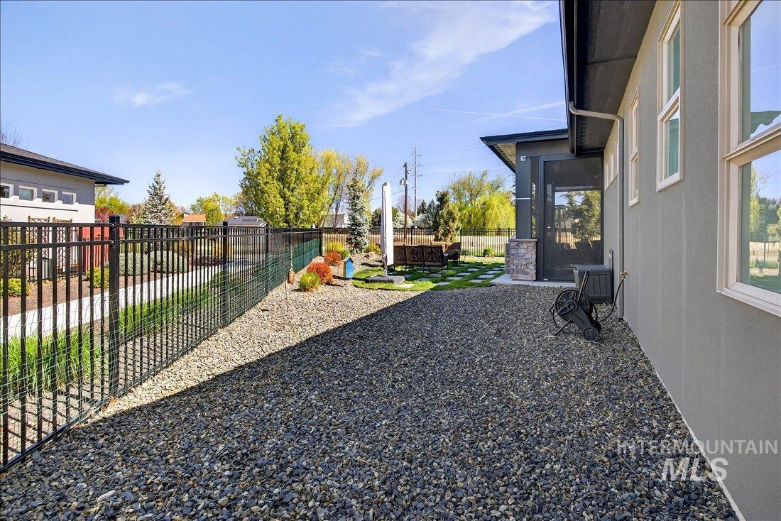 4718 East Goldstone Drive Meridian, ID 83642 - Photo 43 of 50 Fenced backyard featuring a patio