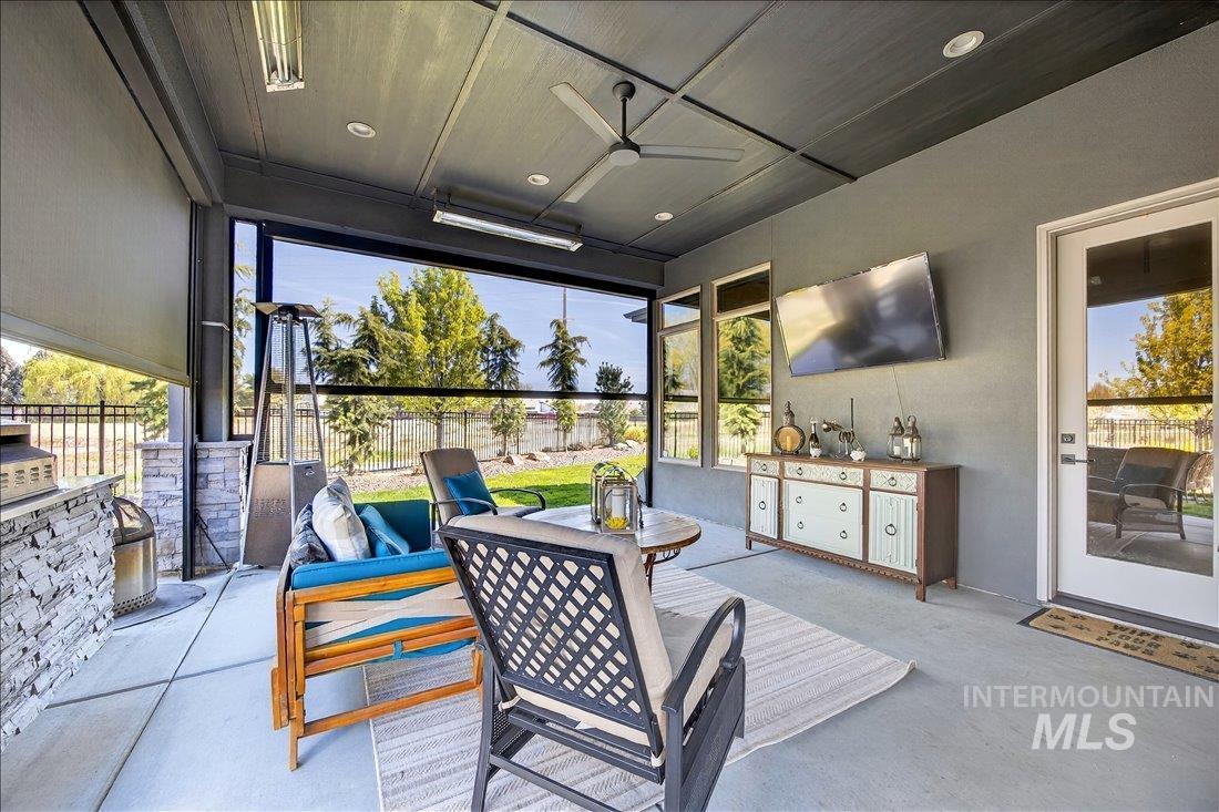 4718 East Goldstone Drive Meridian, ID 83642 - Photo 4 of 50 View of patio featuring area for grilling and ceiling fan
