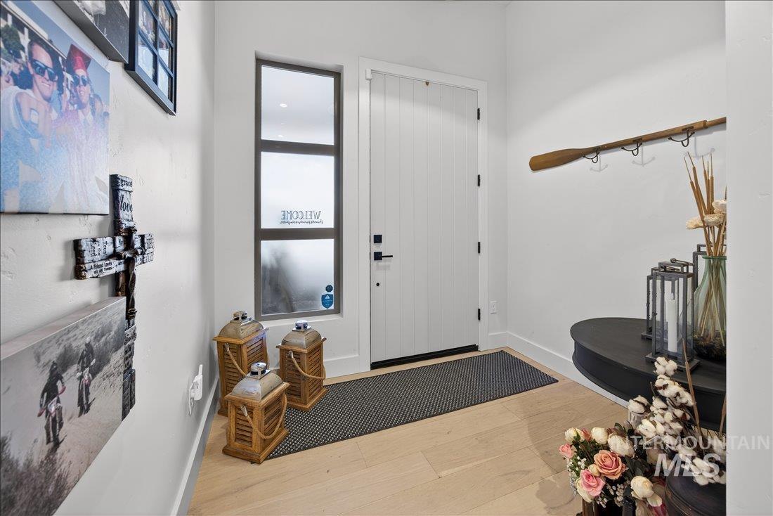 4718 East Goldstone Drive Meridian, ID 83642 - Photo 9 of 50 Entryway with baseboards and light wood finished floors