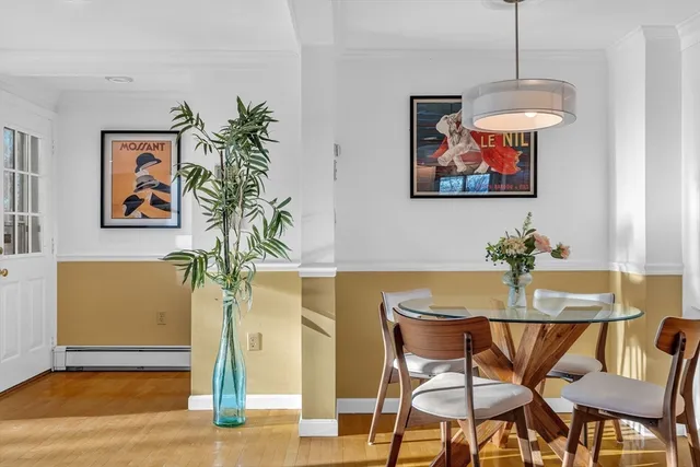 a view of a house with a yard covered in snow