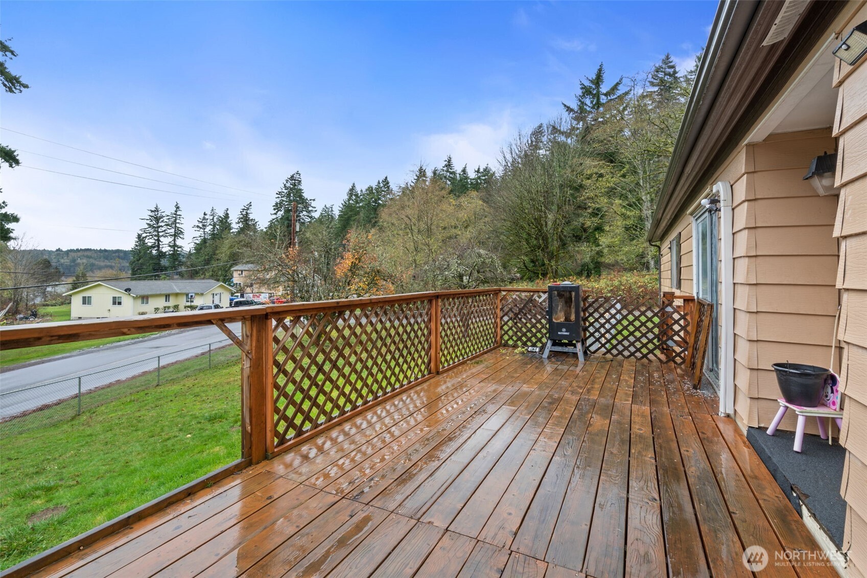 4692 Sherman Heights Road Bremerton, WA 98312 - Photo 25 of 28 a view of a balcony with wooden floor