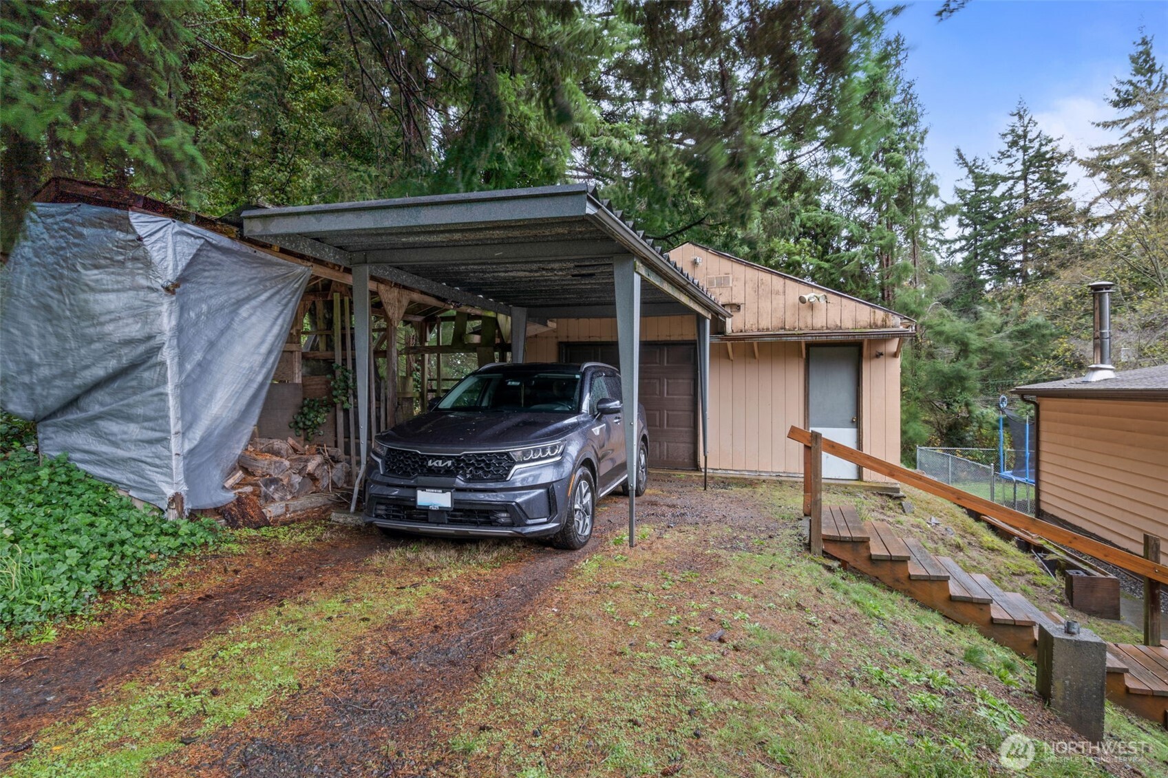 4692 Sherman Heights Road Bremerton, WA 98312 - Photo 28 of 28 a view of a car in garage