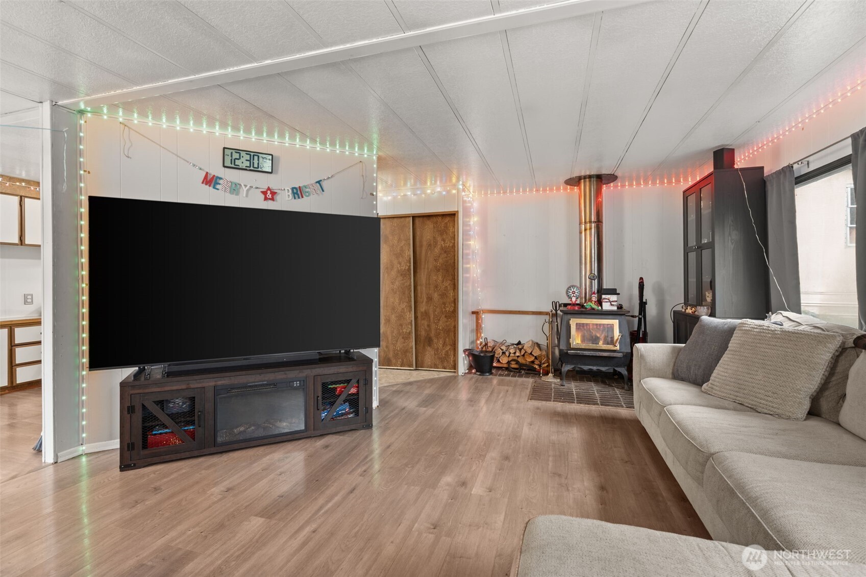 4692 Sherman Heights Road Bremerton, WA 98312 - Photo 7 of 28 a living room with furniture and a flat screen tv