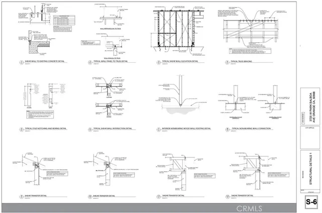 an aerial view of houses with outdoor space