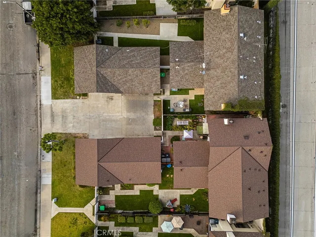 a view of hallway with wooden floor