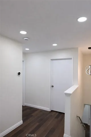 an aerial view of multiple houses with outdoor space