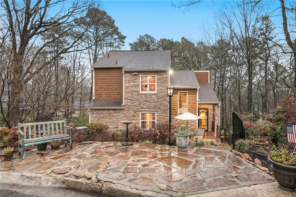 1833 Tree Top Court Marietta, GA 30062 - Photo 1 of 1 a backyard of a house with yard and outdoor seating