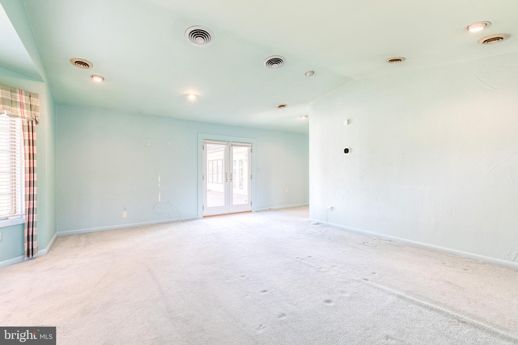 602 Hampton Lane Baltimore, MD 21286 - Photo 22 of 41 a view of an empty room with a window
