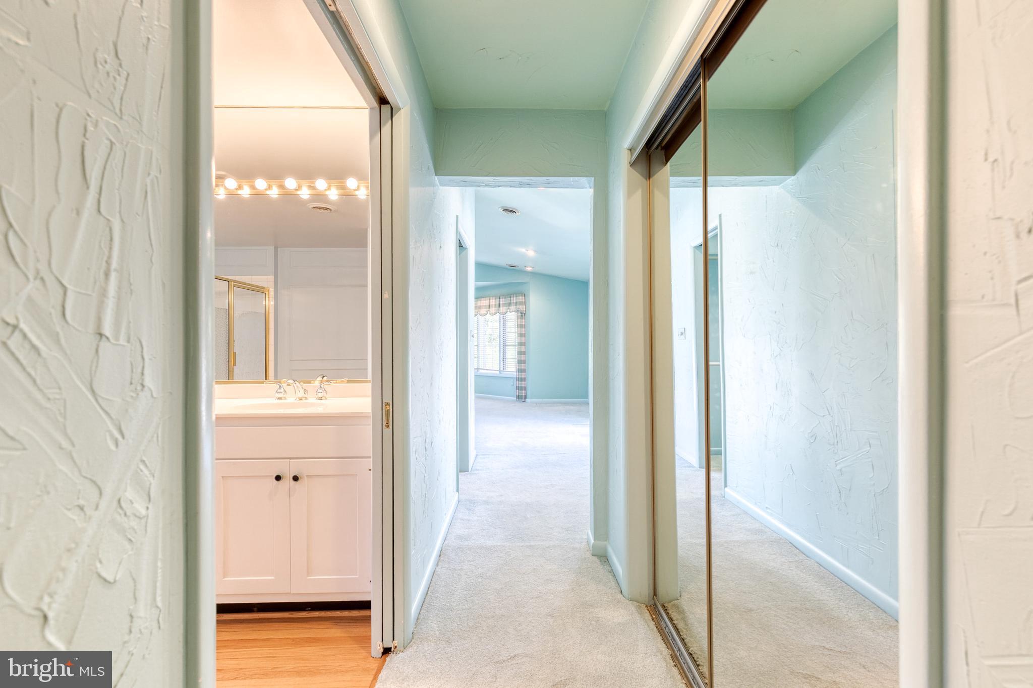 602 Hampton Lane Baltimore, MD 21286 - Photo 23 of 41 a view of a bathroom from a hallway