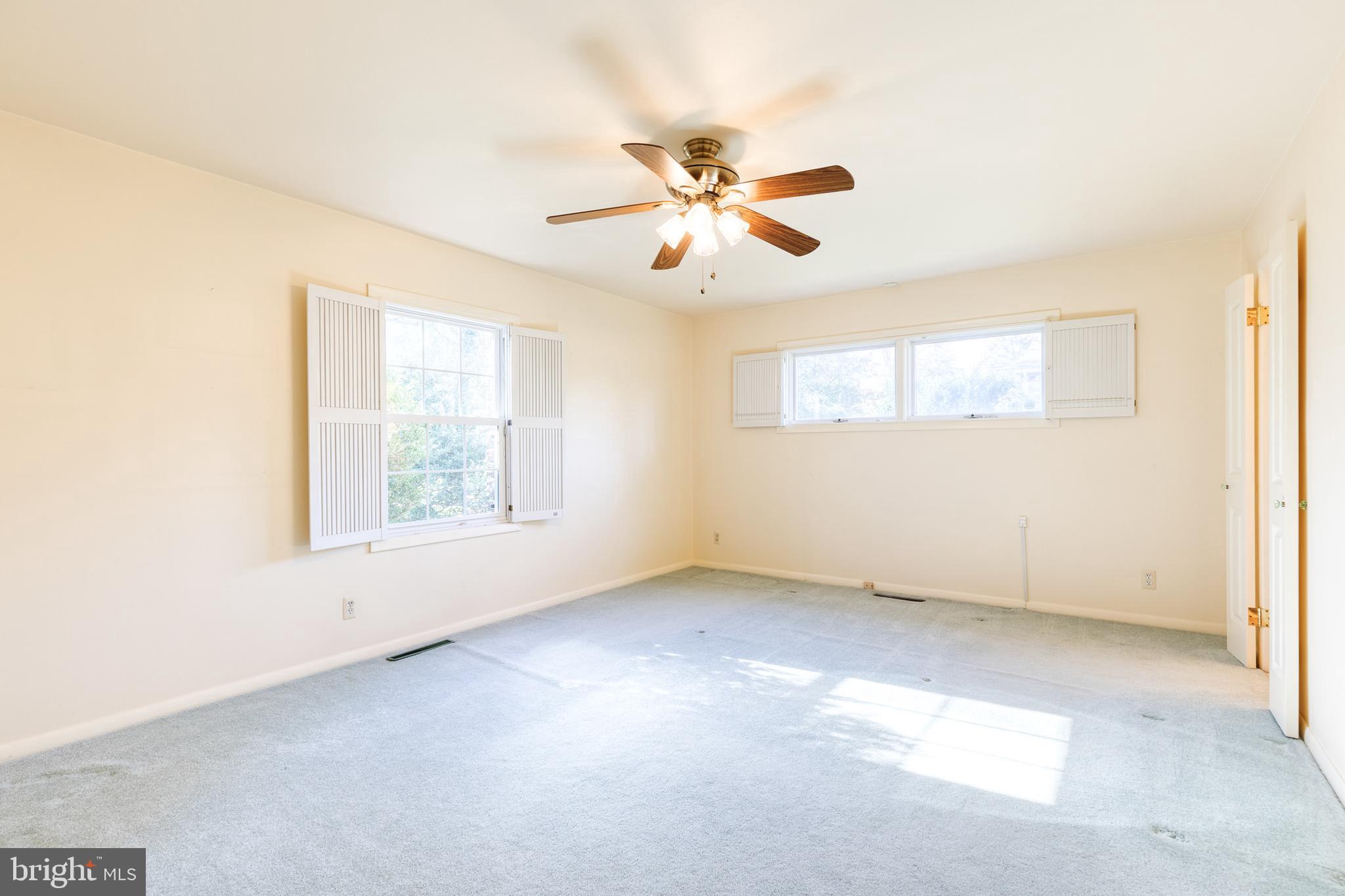 602 Hampton Lane Baltimore, MD 21286 - Photo 29 of 41 a view of an empty room with a window