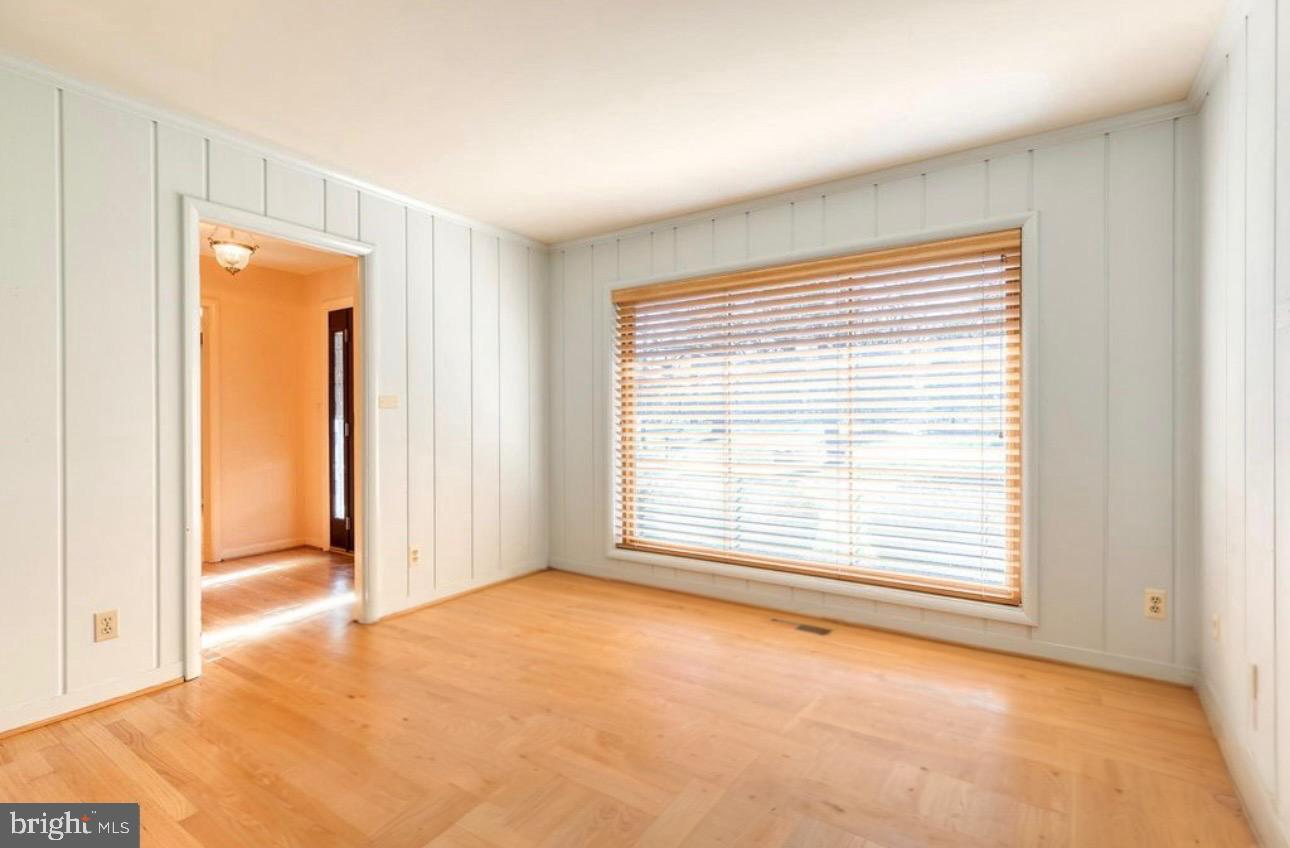 602 Hampton Lane Baltimore, MD 21286 - Photo 9 of 41 a view of an empty room with a window