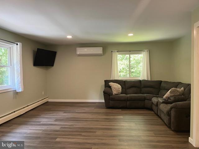 1663 Sawmill Road Spring City, PA 19475 - Photo 7 of 26 Huge family room w/mini split, TV, large wndws