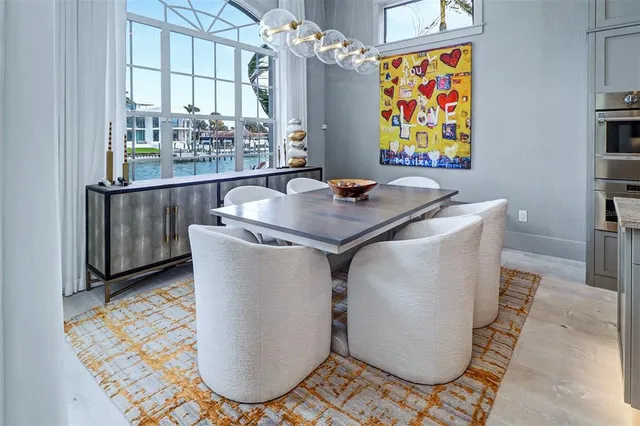 a room with table and chairs