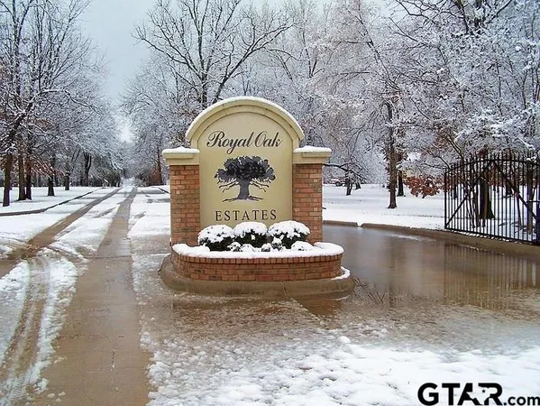 a view of a water fountain with a bench in front of it