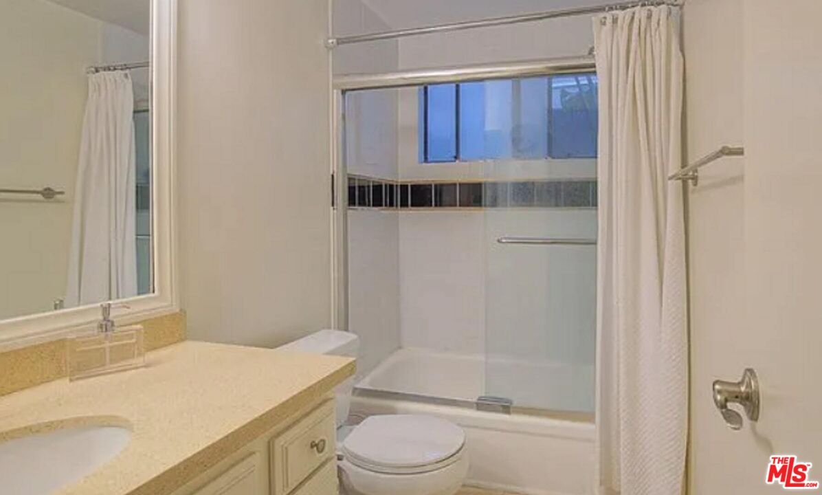 723 Westmount Drive, Unit 203 West Hollywood, CA 90069 - Photo 14 of 17 a bathroom with a sink a toilet and shower