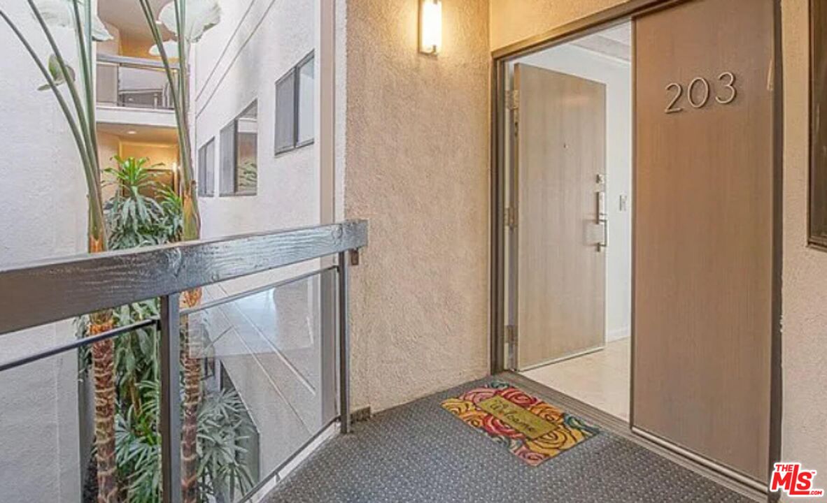 723 Westmount Drive, Unit 203 West Hollywood, CA 90069 - Photo 17 of 17 a view of an entryway with a door