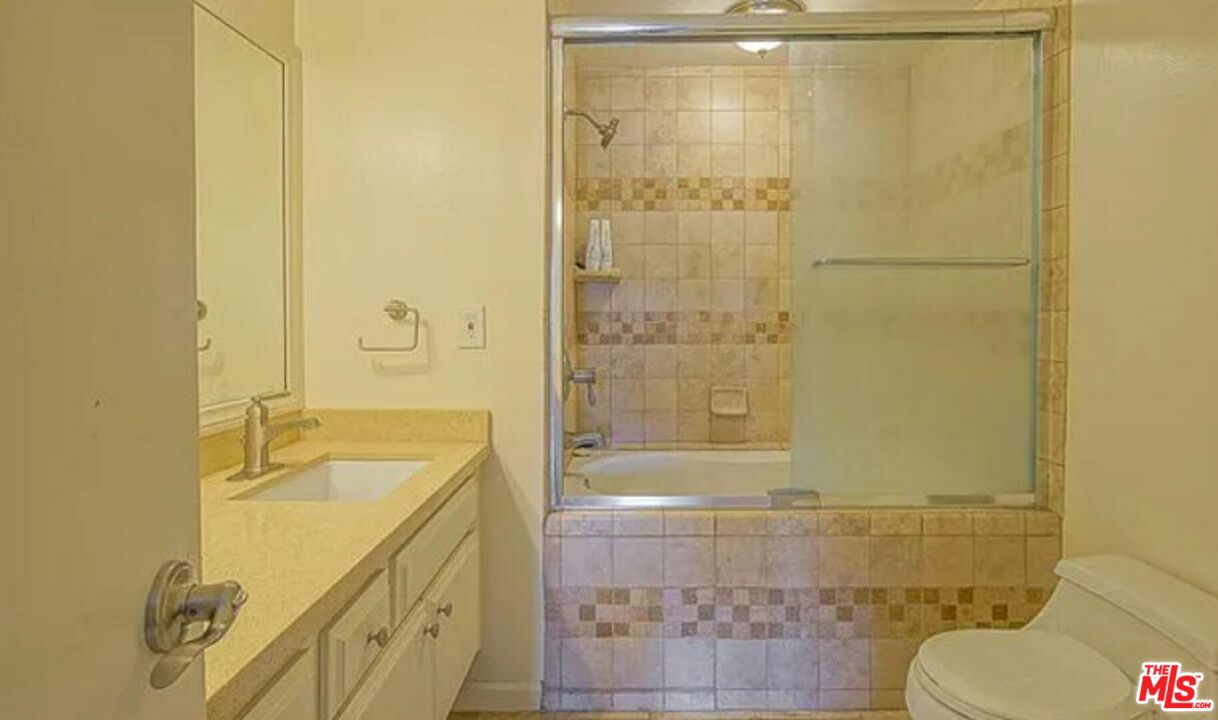 723 Westmount Drive, Unit 203 West Hollywood, CA 90069 - Photo 10 of 17 a bathroom with a sink and a shower