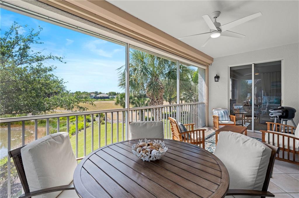 10422 Autumn Breeze Drive, Unit 201 Estero, FL 34135 - Photo 28 of 34 a view of a roof deck with furniture