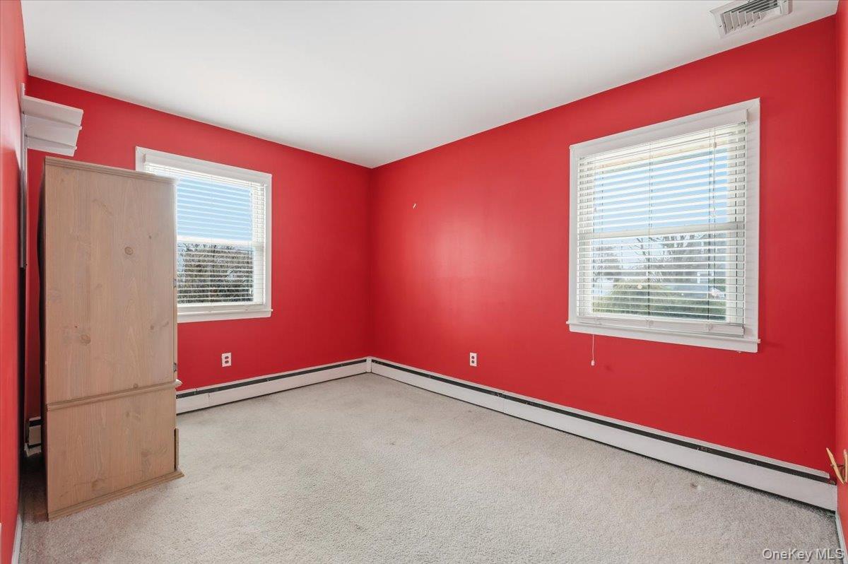 13 Jean Road West Islip, NY 11795 - Photo 12 of 25 a view of a living room with window