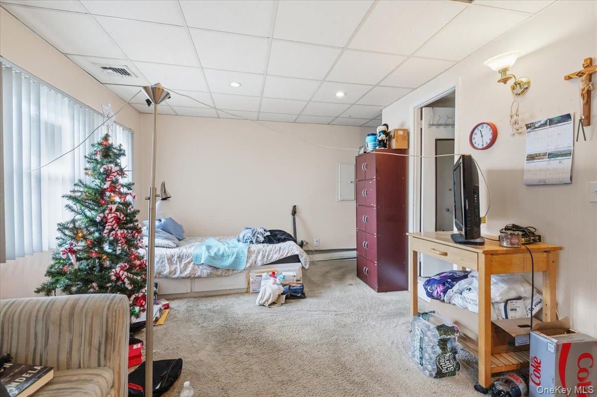 13 Jean Road West Islip, NY 11795 - Photo 14 of 25 a view of a room with gym equipment