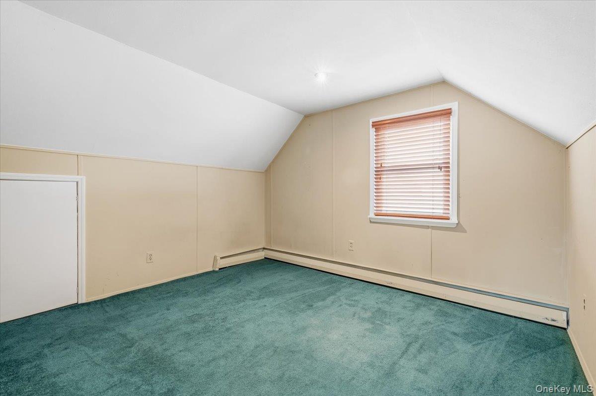 13 Jean Road West Islip, NY 11795 - Photo 18 of 25 an empty room with a window