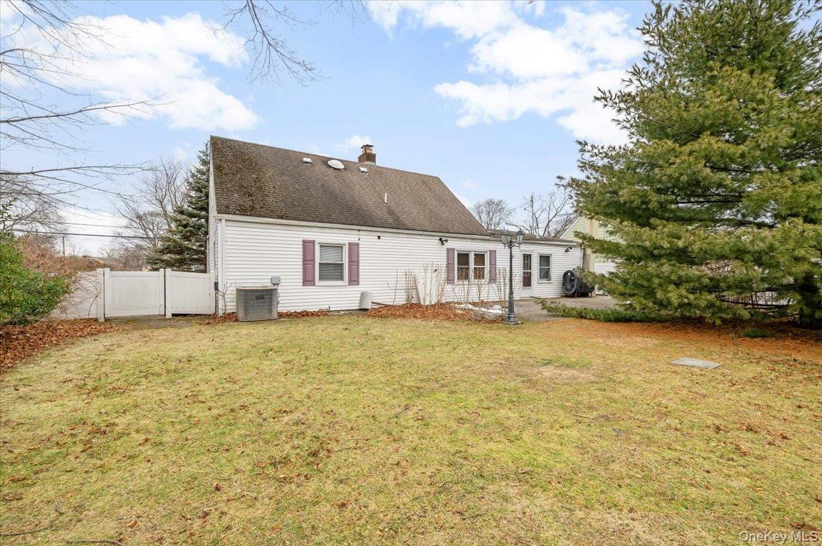 13 Jean Road West Islip, NY 11795 - Photo 19 of 25 a view of a house with backyard and garden