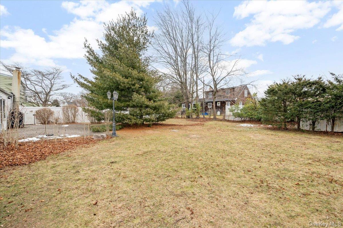 13 Jean Road West Islip, NY 11795 - Photo 21 of 25 a street view with residential house