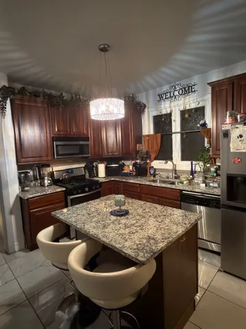 a kitchen with granite countertop lots of counter top space