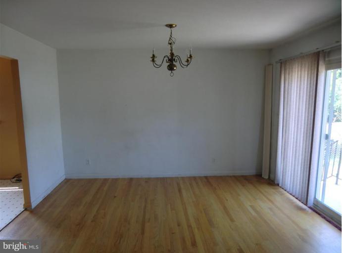 3806 Offutt Road Randallstown, MD 21133 - Photo 8 of 30 an empty room with windows