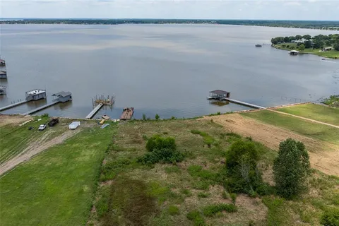 a view of a lake with a building in the background